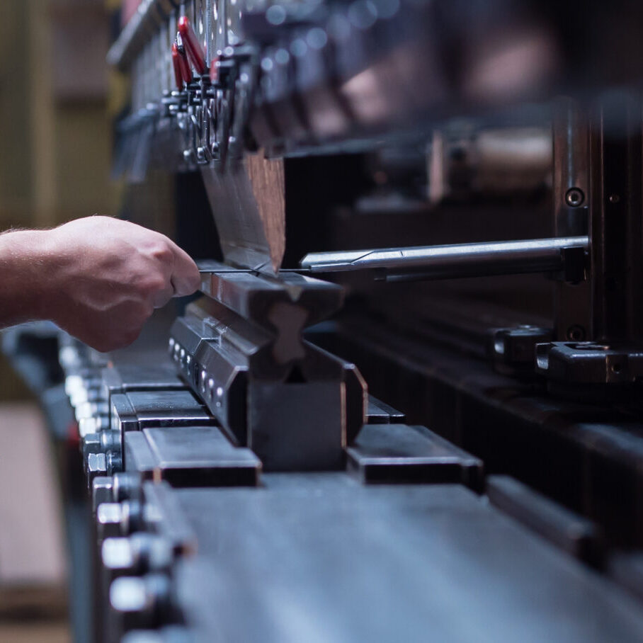 Right,Side,Close-up,Of,A,Worker,Holding,A,Metal,Plate Right,Side,Close-up,Of,A,Worker,Holding,A,Metal,Plate